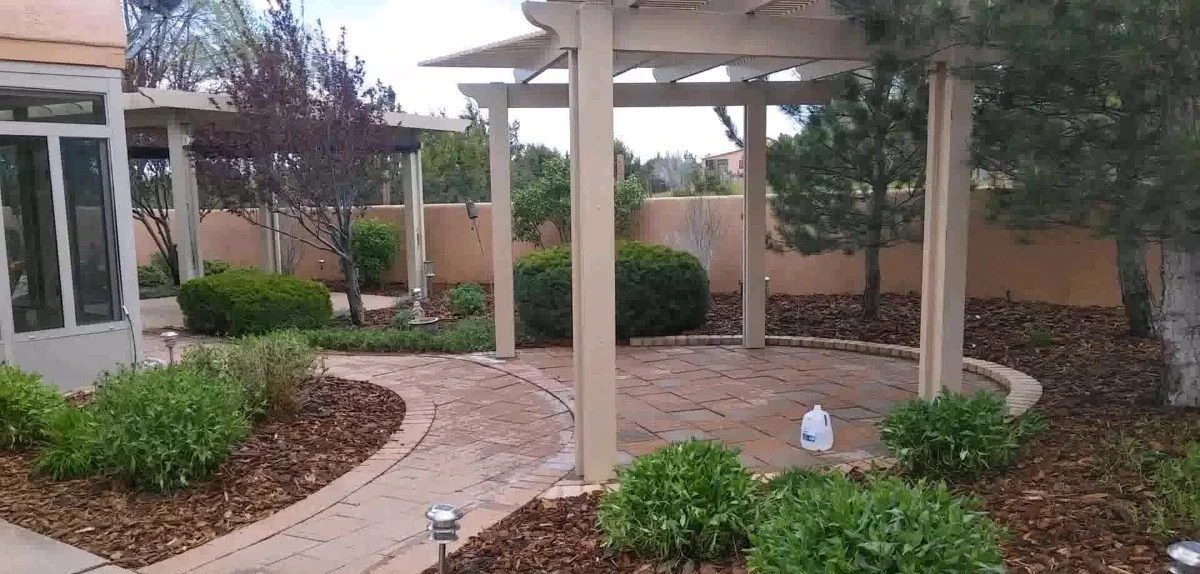 Landscaping las cruces nm commercial courtyard with paver patio and pergola